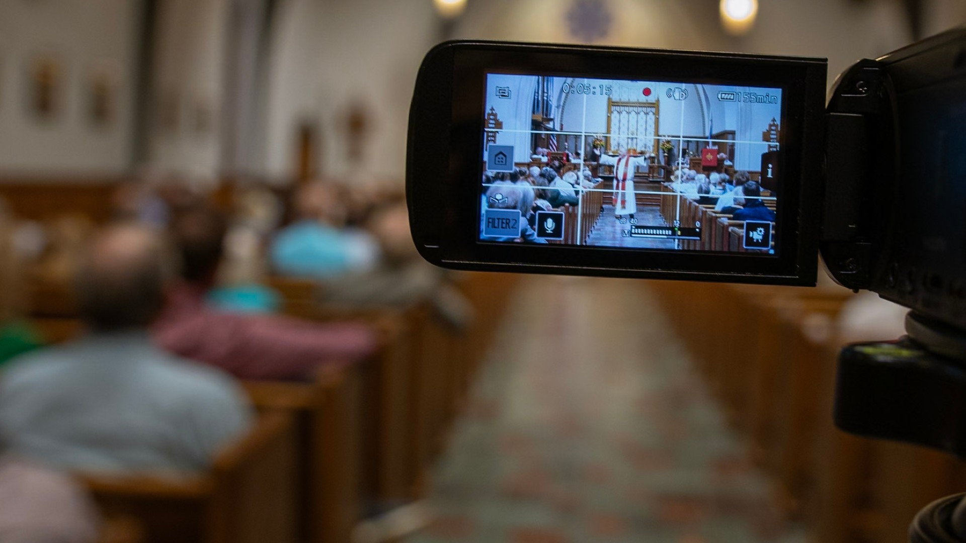 Robert Preaching through video camera