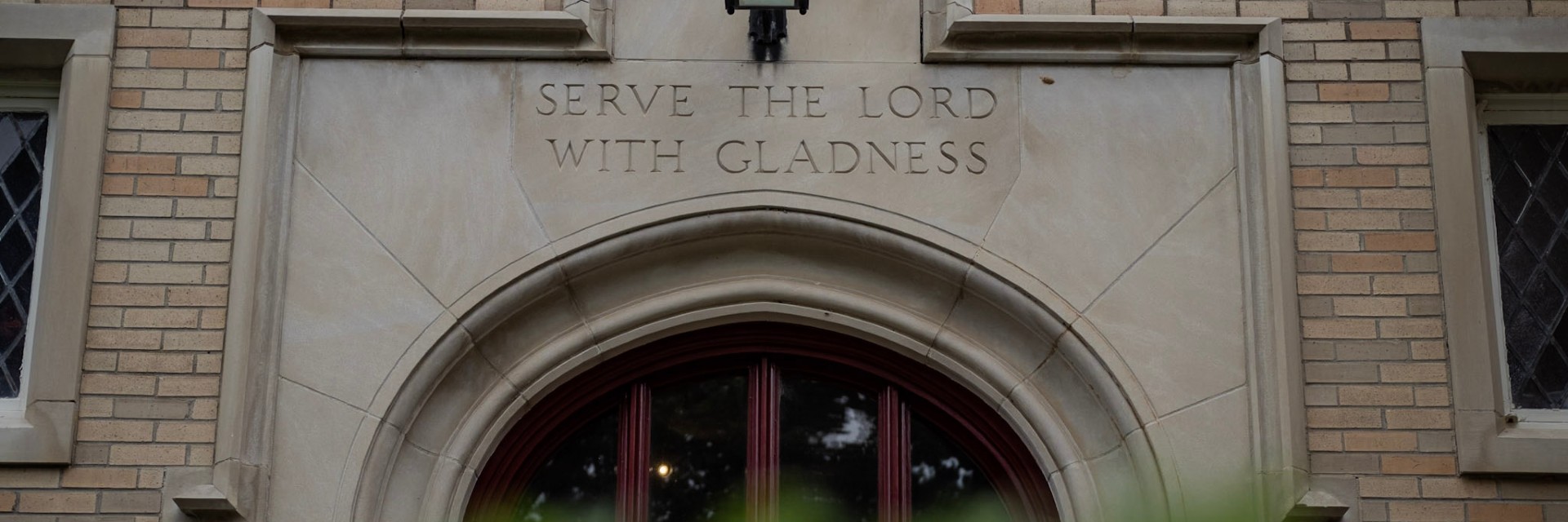 Serve the Lord with Gladness above door