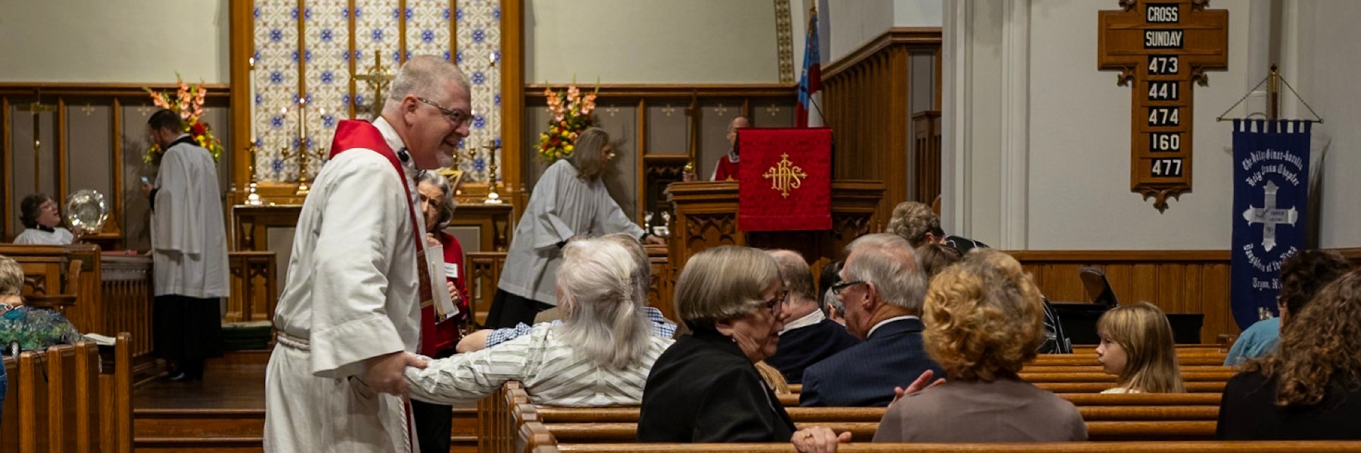 Robert greeting people before the service on Sunday