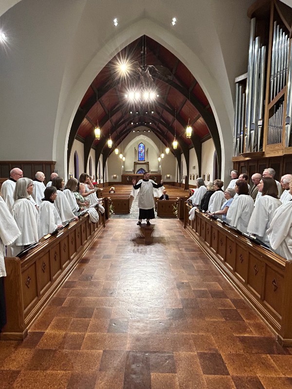 Choir practice facing choir and narthex